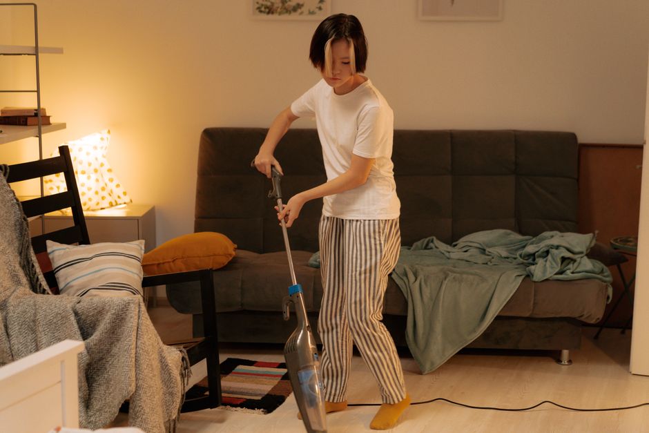 Professional performing recurring house cleaning tasks